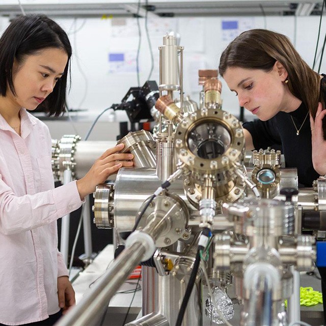 Sarah King and graduate student working in the King lab